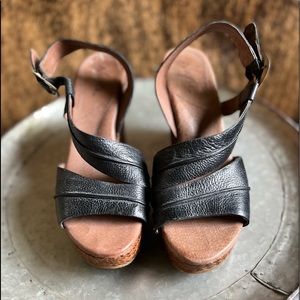 Size 9 born wedge black sandal. Never worn and in mint condition.